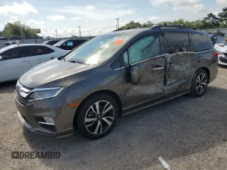 2019 Honda Odyssey Elite with VIN 5FNRL6H90KB027207, listed as a Copart auction lot 60265905 with 69,313 mi miles and Salvage title. Bid and sale history available at DreamBid. Image 1.