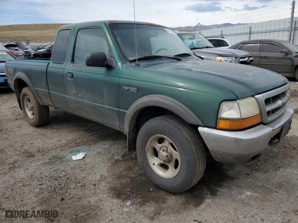 1999 Ford Ranger XLT with VIN 1FTZR15X5XPB74253, listed as a Copart auction lot 49723455 with 254,340 mi miles and Non Repairable. Bid and sale history available at carsss.com. Image 4.
