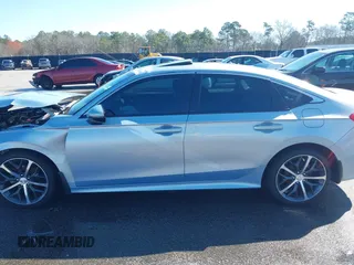 2022 Honda Civic Sedan Touring with VIN 2HGFE1F95NH312164, listed as a IAAI auction lot 41754518 with 84,384 mi miles. Bid and sale history available at carsss.com. Image 14.