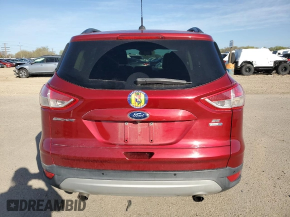 2016 Ford Escape SE with VIN 1FMCU9GX0GUA96770, listed as a Copart auction lot 52564135 with 73,727 mi miles and Salvage Title. Bid and sale history available at carsss.com. Image 6.