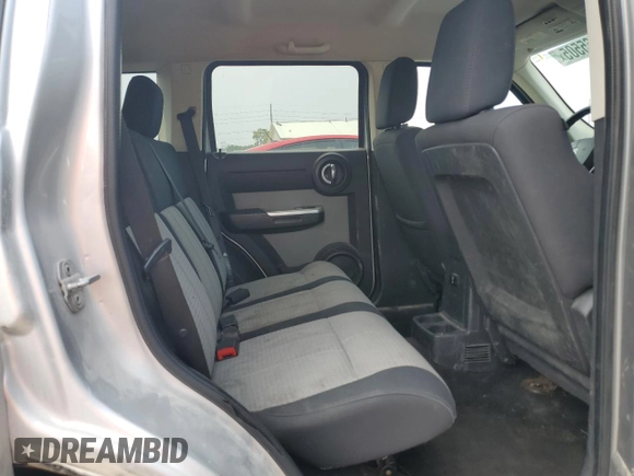 2009 Dodge Nitro SLT with VIN 1D8GU58K09W522094, listed as a Copart auction lot 59765505 with 286,034 mi miles and Salvage title. Bid and sale history available at DreamBid. Image 11.