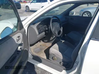 1999 Mazda 626 ES with VIN 1YVGF22C4X5841892, listed as a IAAI auction lot 41678373 with 66,981 mi miles. Bid and sale history available at carsss.com. Image 5.