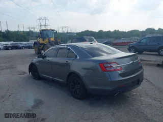 2013 Ford Taurus Limited with VIN 1FAHP2F87DG141383, listed as a IAAI auction lot 40200514 with 158,326 mi miles. Bid and sale history available at carsss.com. Image 3.