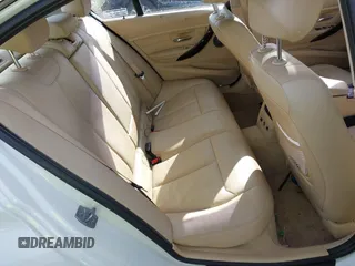 2014 BMW 3 Series 335i xDrive with VIN WBA3B9C52EJ466045, listed as a IAAI auction lot 41281384 with 136,329 mi miles. Bid and sale history available at carsss.com. Image 8.