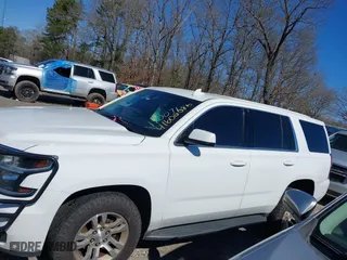 2017 Chevrolet Tahoe Commercial with VIN 1GNSKFEC8HR216301, listed as a IAAI auction lot 41602286 with 160,619 mi miles. Bid and sale history available at carsss.com. Image 14.