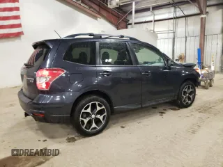 2014 Subaru Forester XT Touring with VIN JF2SJGMC0EH517859, listed as a Copart auction lot 46973505 with 117,907 mi miles and Salvage Title. Bid and sale history available at DreamBid. Image 3.