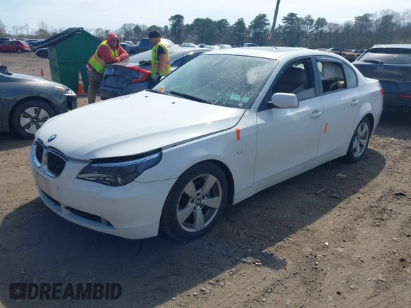 2007 BMW 5 Series 530xi with VIN WBANF73537CU26484, listed as a IAAI auction lot 42060808 with 164,727 mi miles and . Bid and sale history available at carsss.com. Image 2.
