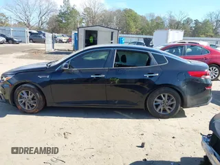 2019 Kia Optima LX with VIN 5XXGT4L31KG357854, listed as a IAAI auction lot 41458399 with 167,500 mi miles. Bid and sale history available at carsss.com. Image 14.