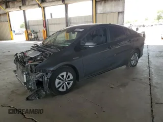 2017 Toyota Prius Two with VIN JTDKBRFU0H3049131, listed as a Copart auction lot 65318675 with 104,813 mi miles and Salvage title. Bid and sale history available at DreamBid. Image 1.