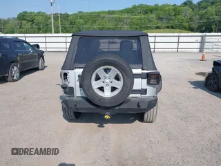 2012 Jeep Wrangler Sport z VIN 1C4AJWAG9CL255278, wystawiony jako IAAI lot #42469091 z przebiegiem 140 480 mil mil oraz . Historia ofert i sprzedaży dostępna na DreamBid. Obrazek 17.