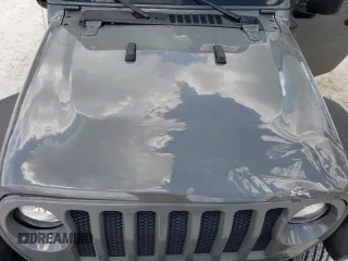 2020 Jeep Wrangler Sport with VIN 1C4GJXAG7LW143240, listed as a Copart auction lot 64058024 with 35,737 mi miles and Salvage title. Bid and sale history available at DreamBid. Image 13.