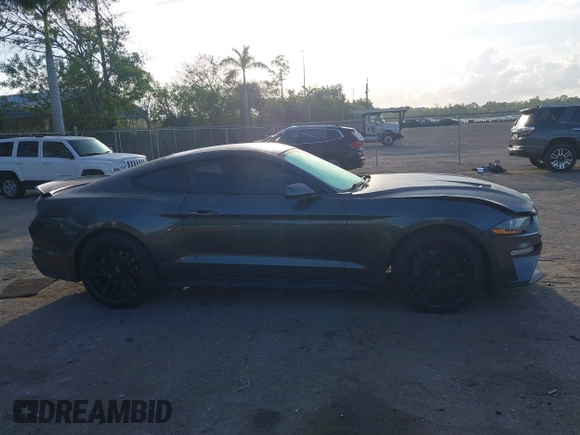 2018 Ford Mustang EcoBoost with VIN 1FA6P8THXJ5172021, listed as a IAAI auction lot 42170389 with 71,772 mi miles and . Bid and sale history available at DreamBid. Image 13.