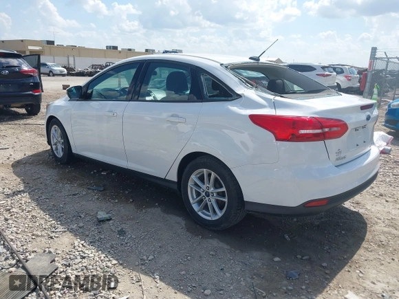 2015 Ford Focus SE with VIN 1FADP3F2XFL335884, listed as a IAAI auction lot 42582740 with 102,036 mi miles and . Bid and sale history available at DreamBid. Image 3.