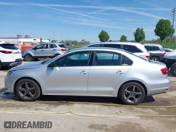 2015 Volkswagen Jetta Sedan 2.0L S with VIN 3VW2K7AJXFM423061, listed as a IAAI auction lot 42083522 with 161,028 mi miles. Bid and sale history available at carsss.com. Image 14.