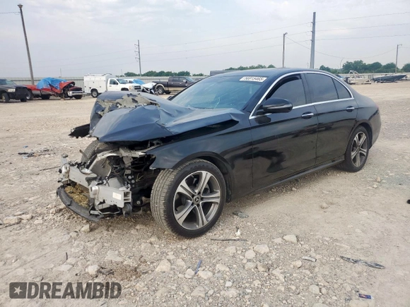 2019 Mercedes-Benz E 300 with VIN WDDZF4JB2KA618999, listed as a Copart auction lot 56915465 with 64,077 mi miles and Salvage title. Bid and sale history available at DreamBid. Image 1.