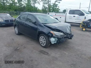 2018 Toyota Corolla L z VIN 2T1BURHE6JC995411, wystawiony jako IAAI lot #42516337 z przebiegiem 98 066 mil mil oraz . Historia ofert i sprzedaży dostępna na DreamBid. Obrazek 1.