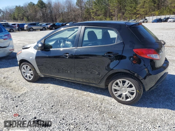 2012 Mazda 2 Sport with VIN JM1DE1KZ2C0149132, listed as a Copart auction lot 45177385 with 146,966 mi miles and Salvage Title. Bid and sale history available at DreamBid. Image 2.