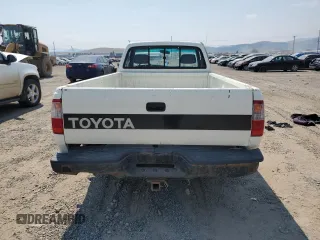 1993 Toyota T100 DX z VIN JT4VD10A5P0010588, wystawiony jako Copart lot #63862014 z przebiegiem 295 012 mil mil oraz Czysty tytuł • Clean title. Historia ofert i sprzedaży dostępna na DreamBid. Obrazek 6.