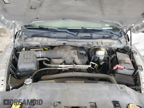 2012 Ram 1500 Tradesman z VIN 3C6JD7DT4CG110093, wystawiony jako Copart lot #53642215 z przebiegiem 110 996 mil mil oraz Szkoda całkowita • Salvage title. Historia ofert i sprzedaży dostępna na DreamBid. Obrazek 11.
