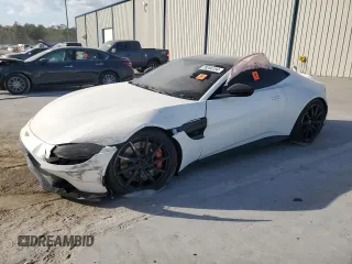 2019 Aston Martin Vantage z VIN SCFSMGAW9KGN01036, wystawiony jako Copart lot #78204154 z przebiegiem Nie podano mil oraz Szkoda całkowita • Salvage title. Historia ofert i sprzedaży dostępna na DreamBid. Obrazek 1.