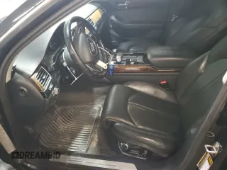 2011 Audi A8 z VIN WAURVAFD7BN006275, wystawiony jako Copart lot #58306205 z przebiegiem 190 383 mil mil oraz Szkody całkowita. Historia ofert i sprzedaży dostępna na DreamBid. Obrazek 7.