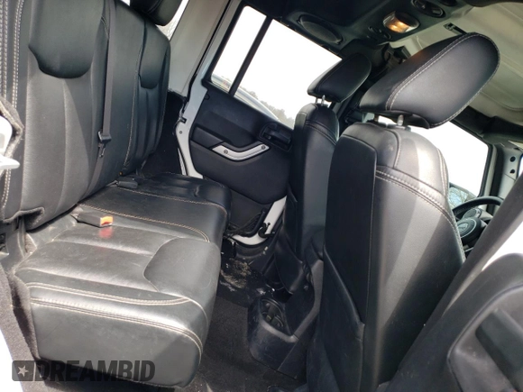 2014 Jeep Wrangler Unlimited Rubicon с VIN 1C4BJWFG9EL150370, выставлен на аукционе Copart как лот 49917075 с пробегом 110 756 миль миль и Списание • Salvage title. История ставок и продаж доступна на DreamBid. Изображение 10.