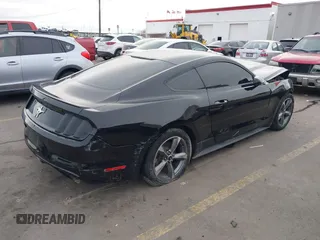2016 Ford Mustang V6 z VIN 1FA6P8AM0G5201793, wystawiony jako IAAI lot #41620599 z przebiegiem 78 576 mil mil oraz . Historia ofert i sprzedaży dostępna na DreamBid. Obrazek 4.