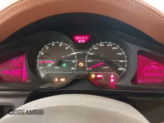 2013 Lotus Evora z VIN SCCLMDSU7DHA10025, wystawiony jako IAAI lot #41298776 z przebiegiem 18 194 mil mil oraz . Historia ofert i sprzedaży dostępna na DreamBid. Obrazek 7.
