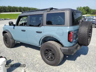 2023 Ford Bronco with VIN 1FMEE5DP7PLB67908, listed as a Copart auction lot 61641545 with 10,256 mi miles and Salvage title. Bid and sale history available at DreamBid. Image 2.