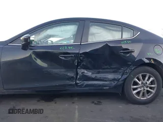 2015 Mazda 3 i Grand Touring with VIN JM1BM1W71F1226283, listed as a IAAI auction lot 41450177 with 136,621 mi miles and . Bid and sale history available at DreamBid. Image 6.