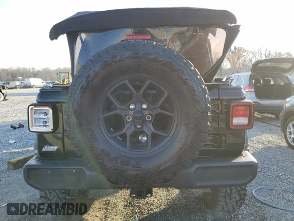 2024 Jeep Wrangler Sport S with VIN 1C4PJXDG1RW277777, listed as a Copart auction lot 49437045 with 10,405 mi miles and Salvage title. Bid and sale history available at DreamBid. Image 6.