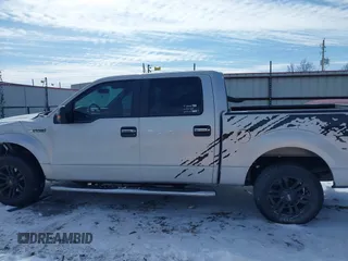 2014 Ford F-150 XL with VIN 1FTFW1CF2EKD03260, listed as a IAAI auction lot 41601219 with 147,306 mi miles. Bid and sale history available at carsss.com. Image 14.