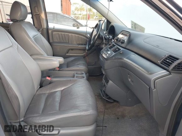 2007 Honda Odyssey EX-L z VIN 5FNRL38717B035384, wystawiony jako IAAI lot #41976861 z przebiegiem 211 640 mil mil oraz . Historia ofert i sprzedaży dostępna na DreamBid. Obrazek 5.