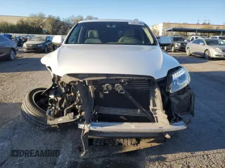 2015 Audi Q7 Premium Plus с VIN WA1LGAFE6FD032285, выставлен на аукционе Copart как лот 54931105 с пробегом 97 218 миль миль и Списание • Salvage title. История ставок и продаж доступна на DreamBid. Изображение 5.