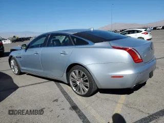2015 Jaguar XJ with VIN SAJWA2GZ4F8V90853, listed as a Copart auction lot 72631114 with 59,237 mi miles and Salvage Title. Bid and sale history available at carsss.com. Image 2.