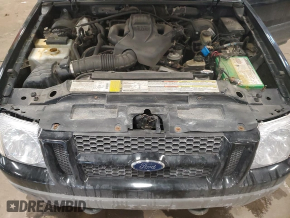 2001 Ford Explorer Sport Trac z VIN 1FMZU77E01UA08076, wystawiony jako Copart lot #45813815 z przebiegiem 158 780 mil mil oraz Czysty tytuł • Clean title. Historia ofert i sprzedaży dostępna na DreamBid. Obrazek 11.
