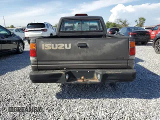 1995 Isuzu Pickup S z VIN JAACL11L8S7200788, wystawiony jako Copart lot #51145765 z przebiegiem 328 108 mil mil oraz Tytuł czysty. Historia ofert i sprzedaży dostępna na DreamBid. Obrazek 6.