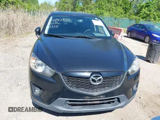 2013 Mazda CX-5 Grand Touring with VIN JM3KE4DE6D0127601, listed as a IAAI auction lot 42143558 with 95,719 mi miles and . Bid and sale history available at DreamBid. Image 12.