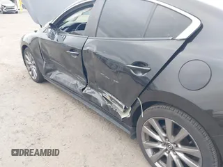 2019 Mazda 3 w/Select with VIN 3MZBPAAL4KM108590, listed as a IAAI auction lot 41726873 with 90,257 mi miles and . Bid and sale history available at carsss.com. Image 6.