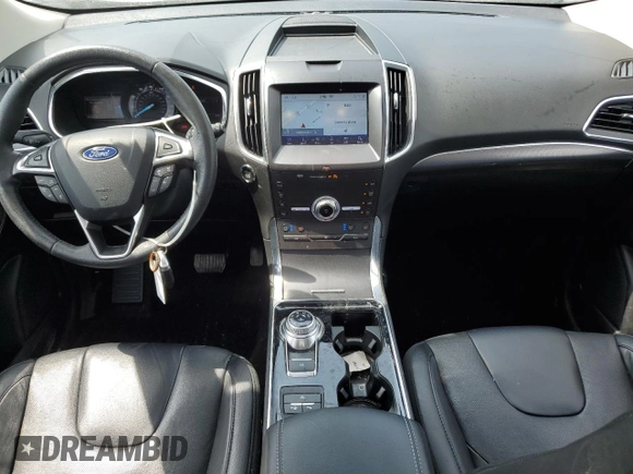 2020 Ford Edge Titanium with VIN 2FMPK3K9XLBB60780, listed as a Copart auction lot 62354735 with 60,328 mi miles and Salvage title. Bid and sale history available at DreamBid. Image 8.