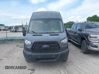 2019 Ford Transit z VIN 1FTYR3XM5KKB13744, wystawiony jako IAAI lot #41768047 z przebiegiem 106 212 mil mil oraz . Historia ofert i sprzedaży dostępna na DreamBid. Obrazek 12.