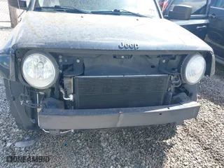 2015 Jeep Patriot Altitude Edition with VIN 1C4NJPBA8FD328401, listed as a IAAI auction lot 41952061 with 134,026 mi miles. Bid and sale history available at carsss.com. Image 6.