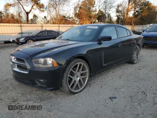 2013 Dodge Charger SE with VIN 2C3CDXBG7DH681218, listed as a Copart auction lot 83423484 with 172,661 mi miles and Salvage Title. Bid and sale history available at carsss.com. Image 1.