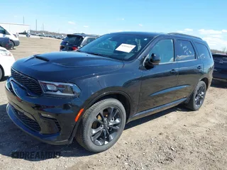 2023 Dodge Durango R/T Plus z VIN 1C4SDHCT9PC567463, wystawiony jako IAAI lot #42054420 z przebiegiem 49 207 mil mil oraz . Historia ofert i sprzedaży dostępna na DreamBid. Obrazek 2.