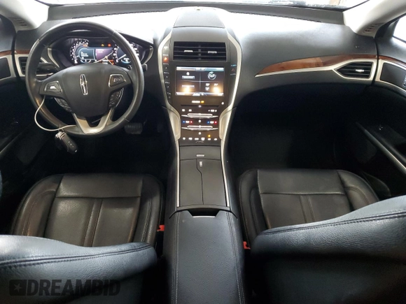2015 Lincoln MKZ z VIN 3LN6L2GK4FR613117, wystawiony jako Copart lot #54141735 z przebiegiem 129 072 mil mil oraz Szkoda całkowita • Salvage title. Historia ofert i sprzedaży dostępna na DreamBid. Obrazek 8.