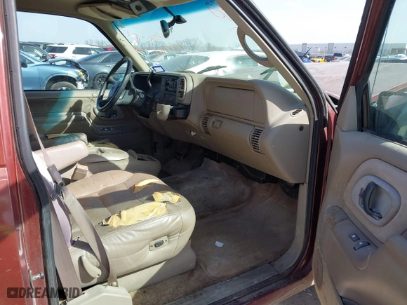 1999 Chevrolet Tahoe with VIN 1GNEC13R9XJ341261, listed as a IAAI auction lot 41741710 with 234,676 mi miles. Bid and sale history available at carsss.com. Image 5.