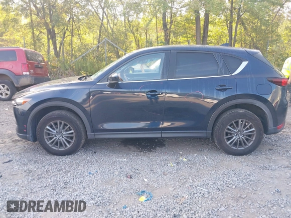 2017 Mazda CX-5 Touring with VIN JM3KFBCL6H0170455, listed as a IAAI auction lot 40381242 with 71,520 mi miles. Bid and sale history available at carsss.com. Image 14.