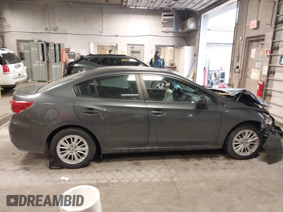 2018 Subaru Impreza Premium z VIN 4S3GKAD67J3619711, wystawiony jako IAAI lot #41475064 z przebiegiem 58 818 mil mil oraz . Historia ofert i sprzedaży dostępna na DreamBid. Obrazek 13.
