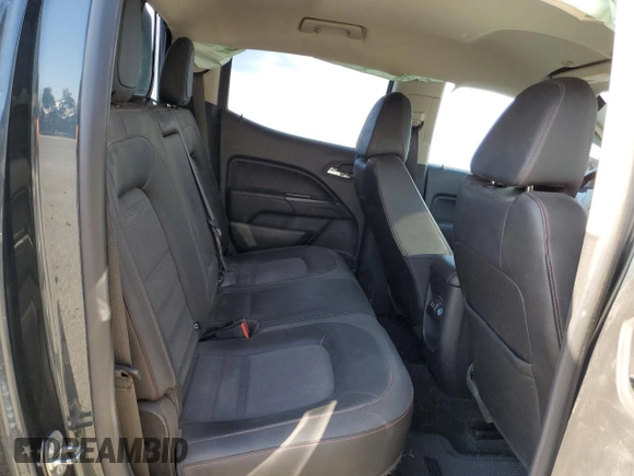 2017 GMC Canyon z VIN 1GTP6CE1XH1252005, wystawiony jako Copart lot #74982794 z przebiegiem 62 797 mil mil oraz Szkoda całkowita • Salvage title. Historia ofert i sprzedaży dostępna na DreamBid. Obrazek 10.