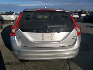 2015 Volvo V60 z VIN YV1612SB6F1211119, wystawiony jako Copart lot #77466004 z przebiegiem 144 388 mil mil oraz Szkoda całkowita • Salvage title. Historia ofert i sprzedaży dostępna na DreamBid. Obrazek 6.